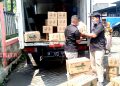 Pendistribusian minyak goreng di Pasar Bulu, Kota Semarang. (ADI/Koran Lingkar)